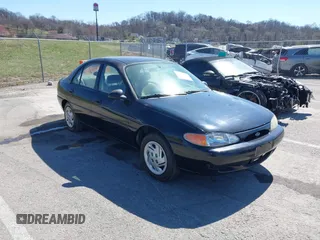 1999 Ford Escort LX with VIN 1FAFP10P3XW287792, listed as a IAAI auction lot 41807938 with 247,141 mi miles. Bid and sale history available at carsss.com. Image 1.