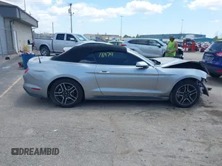 2020 Ford Mustang EcoBoost z VIN 1FATP8UH6L5106537, wystawiony jako IAAI lot #42518474 z przebiegiem 86 971 mil mil oraz . Historia ofert i sprzedaży dostępna na DreamBid. Obrazek 13.