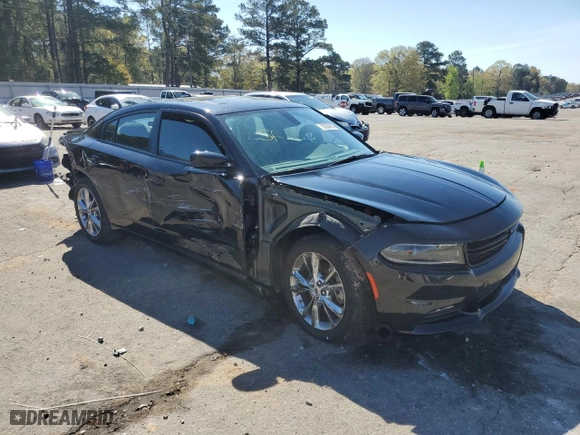 2022 Dodge Charger SXT with VIN 2C3CDXJGXNH262721, listed as a Copart auction lot 50384625 with 81,262 mi miles and Salvage Title. Bid and sale history available at carsss.com. Image 4.