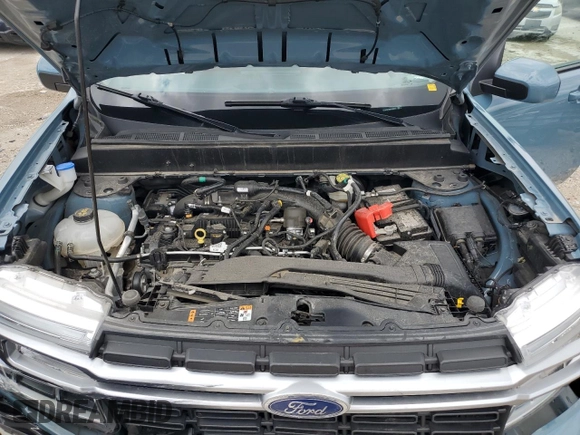 2023 Ford Maverick XL z VIN 3FTTW8F92PRA80959, wystawiony jako Copart lot #57423625 z przebiegiem 31 460 mil mil oraz Szkoda całkowita • Salvage title. Historia ofert i sprzedaży dostępna na DreamBid. Obrazek 11.