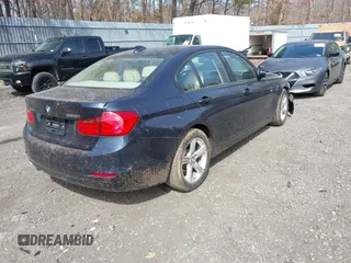2013 BMW 3 Series 328i xDrive with VIN WBA3B5G59DNS01455, listed as a IAAI auction lot 41788947 with 127,677 mi miles. Bid and sale history available at carsss.com. Image 4.