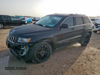 2016 Jeep Grand Cherokee 75th Anniversary with VIN 1C4RJEAG9GC499970, listed as a Copart auction lot 62673925 with 118,627 mi miles and Salvage title. Bid and sale history available at DreamBid. Image 1.