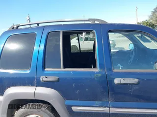 2003 Jeep Liberty Sport with VIN 1J4GL48K83W663248, listed as a IAAI auction lot 42056561 with 161,652 mi miles. Bid and sale history available at carsss.com. Image 6.