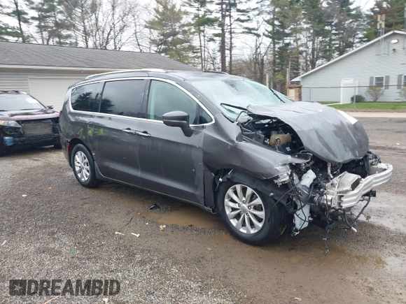 2021 Chrysler Pacifica Touring L with VIN 2C4RC1BG7MR584956, listed as a IAAI auction lot 42016887 with 51,415 mi miles and . Bid and sale history available at DreamBid. Image 1.