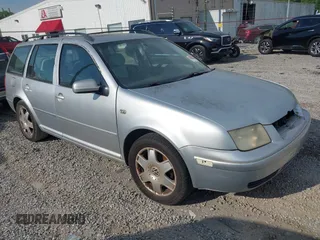 2001 Volkswagen Jetta z VIN WVWTG61J11W579971, wystawiony jako IAAI lot #42032001 z przebiegiem 173 015 mil mil oraz . Historia ofert i sprzedaży dostępna na DreamBid. Obrazek 1.