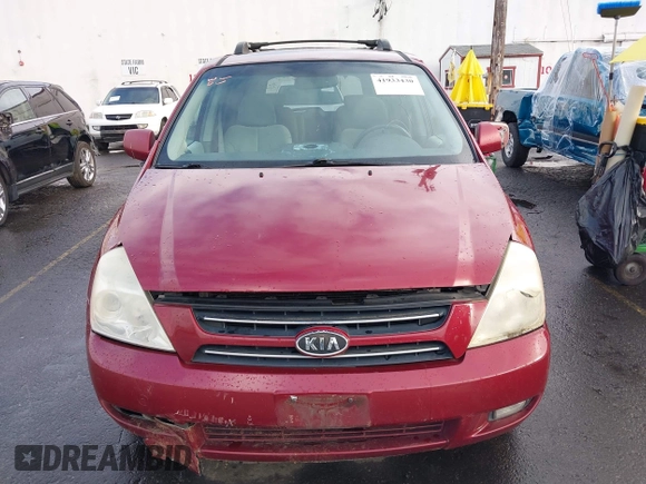 2006 Kia Sedona LX with VIN KNDMB233X66030979, listed as a IAAI auction lot 41933430 with 127,305 mi miles and . Bid and sale history available at DreamBid. Image 6.