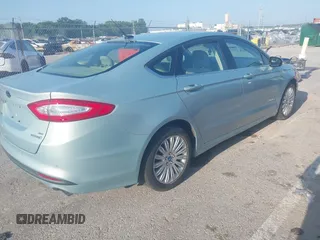 2013 Ford Fusion SE Hybrid with VIN 3FA6P0LU6DR111815, listed as a IAAI auction lot 42809852 with 150,721 mi miles and . Bid and sale history available at DreamBid. Image 4.