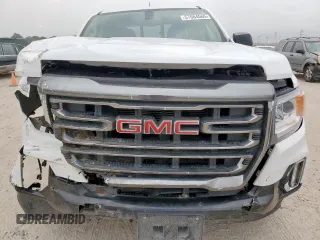 2022 GMC Canyon 4WD AT4 z VIN 1GTG6FEN2N1210072, wystawiony jako Copart lot #57084565 z przebiegiem 64 897 mil mil oraz Szkoda całkowita • Salvage title. Historia ofert i sprzedaży dostępna na DreamBid. Obrazek 5.