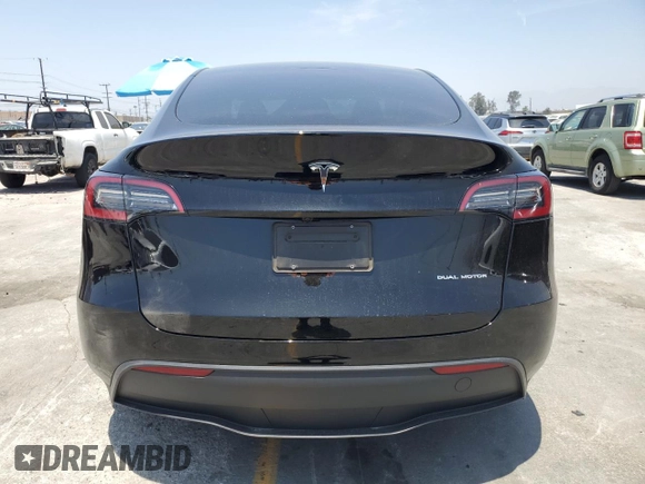 2024 Tesla Model Y Long Range with VIN 7SAYGDEEXRA253111, listed as a Copart auction lot 60929295 with 16,423 mi miles and Salvage title. Bid and sale history available at DreamBid. Image 6.