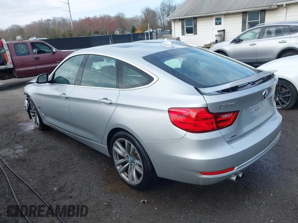 2016 BMW 3 Series 328i Gran Turismo xDrive z VIN WBA8Z5C52GG500852, wystawiony jako IAAI lot #41764251 z przebiegiem 96 176 mil mil oraz . Historia ofert i sprzedaży dostępna na DreamBid. Obrazek 3.