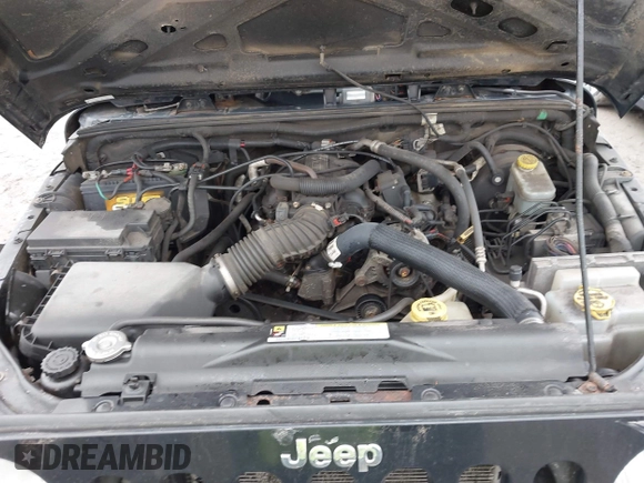 2008 Jeep Wrangler Unlimited X with VIN 1J4GA39138L641138, listed as a IAAI auction lot 41986230 with 215,026 mi miles. Bid and sale history available at carsss.com. Image 10.