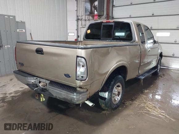 1999 Ford F-150 with VIN 1FTRX18W0XKA68363, listed as a IAAI auction lot 41524104 with 218,400 mi miles and . Bid and sale history available at DreamBid. Image 4.