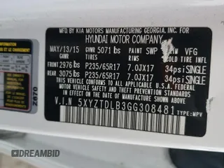 2016 Hyundai Santa Fe z VIN 5XYZTDLB3GG308481, wystawiony jako Copart lot #57788255 z przebiegiem 100 174 mil mil oraz Szkoda całkowita • Salvage title. Historia ofert i sprzedaży dostępna na DreamBid. Obrazek 13.