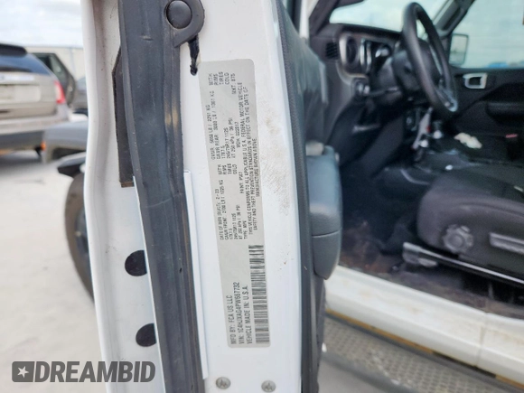 2023 Jeep Wrangler Sport with VIN 1C4HJXAG4PW667732, listed as a Copart auction lot 61261215 with 48,089 mi miles and Salvage title. Bid and sale history available at DreamBid. Image 12.