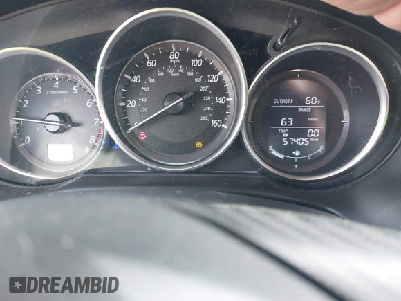 2016 Mazda CX-5 Sport with VIN JM3KE4BY8G0785812, listed as a IAAI auction lot 42324083 with 57,405 mi miles and . Bid and sale history available at DreamBid. Image 7.