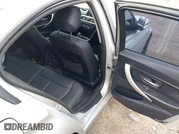 2014 BMW 3 Series 320i xDrive with VIN WBA3C3C58EP661364, listed as a IAAI auction lot 41947049 with 211,982 mi miles and . Bid and sale history available at DreamBid. Image 8.