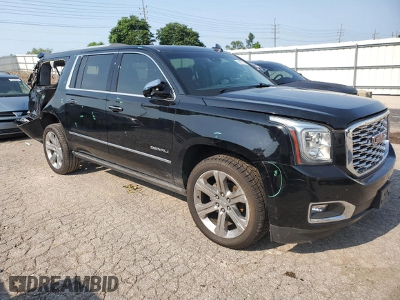 2019 GMC Yukon XL Denali with VIN 1GKS2HKJ7KR174772, listed as a Copart auction lot 63087134 with 69,692 mi miles and Salvage Title. Bid and sale history available at carsss.com. Image 4.