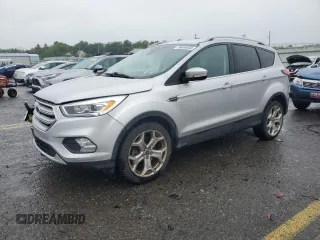 2019 Ford Escape Titanium with VIN 1FMCU9J99KUB44026, listed as a Copart auction lot 58495855 with 106,361 mi miles and Salvage title. Bid and sale history available at DreamBid. Image 1.