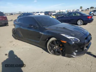 2009 Nissan GT-R Premium с VIN JN1AR54F29M250693, выставлен на аукционе Copart как лот 88759215 с пробегом 47 001 миль миль и Списание • Salvage title. История ставок и продаж доступна на DreamBid. Изображение 4.