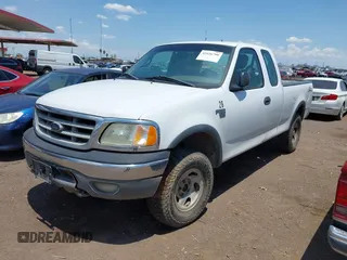 2002 Ford F-150 XL with VIN 2FTRX18W02CA22920, listed as a IAAI auction lot 42426790 with 153,433 mi miles and . Bid and sale history available at DreamBid. Image 2.
