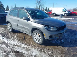 2017 Volkswagen Tiguan S with VIN WVGAV7AX1HK050251, listed as a IAAI auction lot 41608261 with 172,298 mi miles and . Bid and sale history available at DreamBid. Image 1.