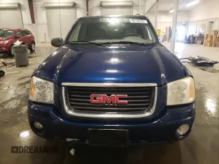 2003 GMC Envoy SLT with VIN 1GKDT13S132184373, listed as a Copart auction lot 46138705 with 130,612 mi miles and Salvage Title. Bid and sale history available at carsss.com. Image 5.
