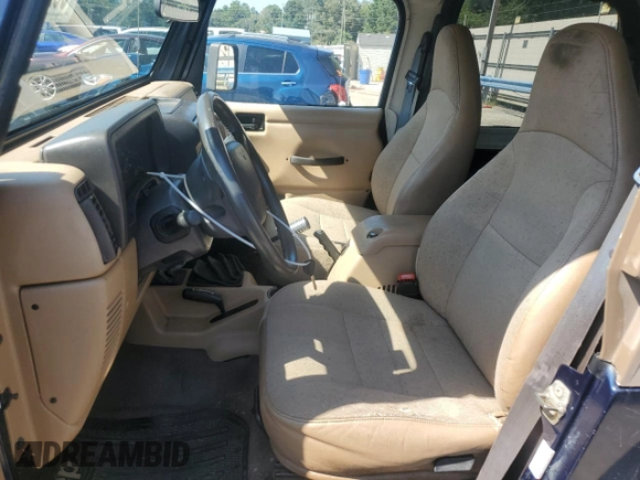 2002 Jeep Wrangler X with VIN 1J4FA39S32P735671, listed as a Copart auction lot 68236084 with 137,587 mi miles and Salvage Title. Bid and sale history available at carsss.com. Image 7.