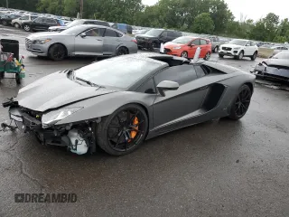 2014 Lamborghini Aventador z VIN ZHWUR1ZD6ELA03035, wystawiony jako Copart lot #66784084 z przebiegiem 23 771 mil mil oraz Szkody całkowita. Historia ofert i sprzedaży dostępna na DreamBid. Obrazek 1.