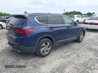 2021 Hyundai Santa Fe SE with VIN 5NMS14AJ2MH323542, listed as a IAAI auction lot 42182576 with 69,385 mi miles and . Bid and sale history available at DreamBid. Image 4.