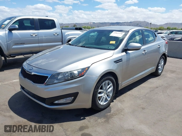 2013 Kia Optima LX with VIN KNAGM4A74D5423255, listed as a IAAI auction lot 42065230 with 116,589 mi miles. Bid and sale history available at carsss.com. Image 2.