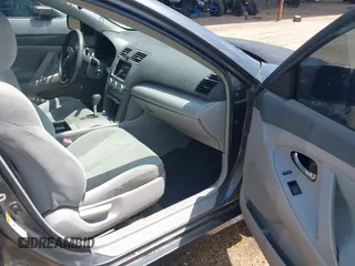 2009 Toyota Camry with VIN 4T1BE46K19U822477, listed as a IAAI auction lot 42052700 with 218,509 mi miles. Bid and sale history available at carsss.com. Image 5.