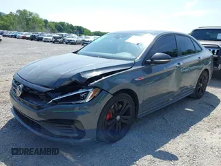 2021 Volkswagen Jetta GLI S z VIN 3VW6T7BU9MM052902, wystawiony jako IAAI lot #42286711 z przebiegiem 91 519 mil mil oraz . Historia ofert i sprzedaży dostępna na DreamBid. Obrazek 6.