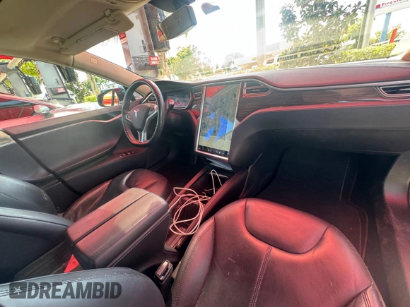 2014 Tesla Model S 60 with VIN 5YJSA1H10EFP49351, listed as a Copart auction lot 54173275 with 96,300 mi miles and Clean Title. Bid and sale history available at DreamBid. Image 9.