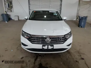 2021 Volkswagen Jetta S z VIN 3VWC57BU4MM014328, wystawiony jako Copart lot #53358745 z przebiegiem 88 307 mil mil oraz Czysty tytuł • Clean title. Historia ofert i sprzedaży dostępna na DreamBid. Obrazek 5.