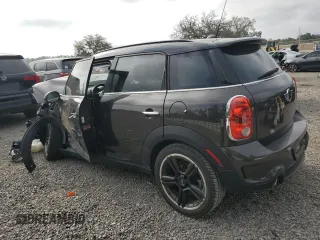 2015 MINI Countryman S with VIN WMWZC3C57FWP52868, listed as a Copart auction lot 54909085 with 68,003 mi miles and Salvage title. Bid and sale history available at DreamBid. Image 2.