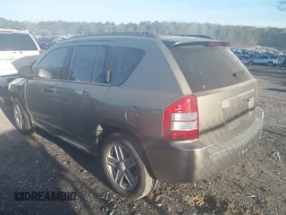 2007 Jeep Compass Sport with VIN 1J8FT47W57D158543, listed as a IAAI auction lot 41817636 with 241,439 mi miles. Bid and sale history available at carsss.com. Image 3.