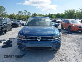 2019 Volkswagen Tiguan SE with VIN 3VV3B7AX2KM006055, listed as a IAAI auction lot 42023713 with 83,570 mi miles and . Bid and sale history available at DreamBid. Image 13.