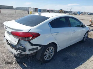 2017 Kia Forte S with VIN 3KPFL4A71HE086412, listed as a IAAI auction lot 42004117 with 201,729 mi miles and . Bid and sale history available at DreamBid. Image 4.