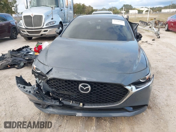 2022 Mazda 3 Carbon Edition z VIN JM1BPACL2N1509492, wystawiony jako IAAI lot #41198183 z przebiegiem Nie podano mil oraz . Historia ofert i sprzedaży dostępna na DreamBid. Obrazek 11.
