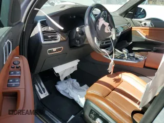 2023 BMW X5 xDrive45e with VIN 5UXTA6C0XP9P49482, listed as a Copart auction lot 56730735 with Not provided miles and Salvage title. Bid and sale history available at DreamBid. Image 8.