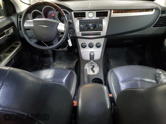 2010 Chrysler Sebring Limited with VIN 1C3CC5FD1AN190847, listed as a Copart auction lot 51219675 with 144,025 mi miles and Salvage title. Bid and sale history available at DreamBid. Image 8.