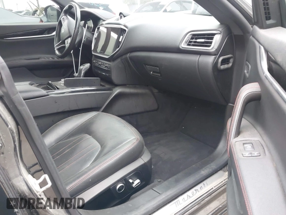 2021 Maserati Ghibli S with VIN ZAM57YSA3M1365483, listed as a IAAI auction lot 42562390 with 51,954 mi miles and . Bid and sale history available at DreamBid. Image 5.