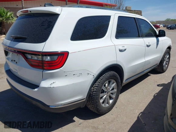 2016 Dodge Durango SXT with VIN 1C4RDHAG3GC361849, listed as a IAAI auction lot 42228712 with 128,084 mi miles and . Bid and sale history available at DreamBid. Image 4.