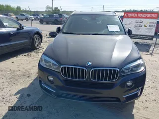 2014 BMW X5 xDrive35d with VIN 5UXKS4C57E0J93982, listed as a IAAI auction lot 42085173 with 169,908 mi miles. Bid and sale history available at carsss.com. Image 6.