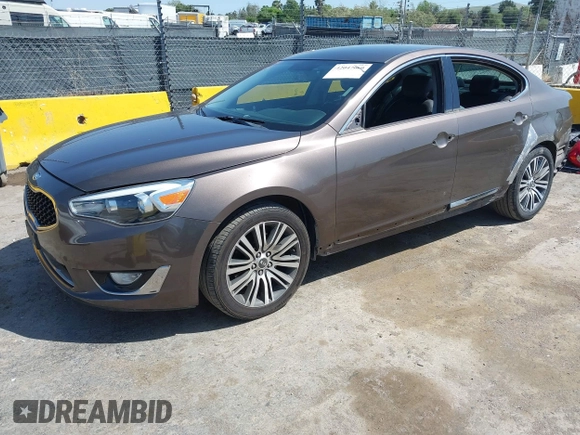 2014 Kia Cadenza Premium z VIN KNALN4D70E5152333, wystawiony jako IAAI lot #42047660 z przebiegiem 107 686 mil mil oraz . Historia ofert i sprzedaży dostępna na DreamBid. Obrazek 2.