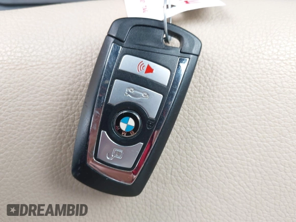 2014 BMW 5 Series 535i xDrive with VIN WBA5B3C57ED537549, listed as a IAAI auction lot 41047583 with 69,005 mi miles and . Bid and sale history available at carsss.com. Image 11.
