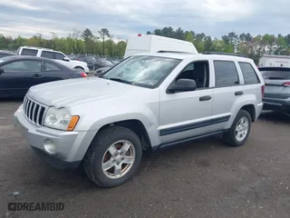 2005 Jeep Grand Cherokee Laredo with VIN 1J4GS48K75C644259, listed as a IAAI auction lot 42044878 with 250,841 mi miles. Bid and sale history available at carsss.com. Image 2.