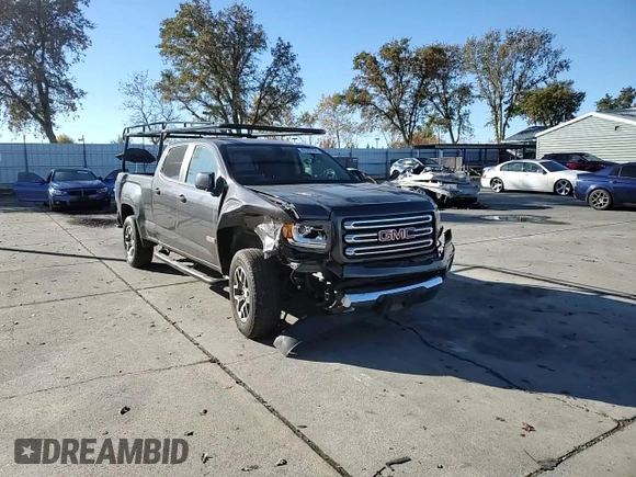 2015 GMC Canyon 2WD SLE with VIN 1GTG5BE38F1240947, listed as a Copart auction lot 82707204 with 63,049 mi miles and Salvage Title. Bid and sale history available at carsss.com. Image 11.