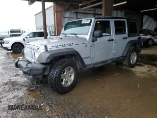 2007 Jeep Wrangler Unlimited Rubicon z VIN 1J4GA69187L127012, wystawiony jako Copart lot #48818965 z przebiegiem 61 737 mil mil oraz Szkoda całkowita • Salvage title. Historia ofert i sprzedaży dostępna na DreamBid. Obrazek 1.