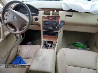 2002 Mercedes-Benz E-Class with VIN WDBJF82J62X067198, listed as a Copart auction lot 66073494 with 0 mi miles and Salvage Title. Bid and sale history available at carsss.com. Image 8.